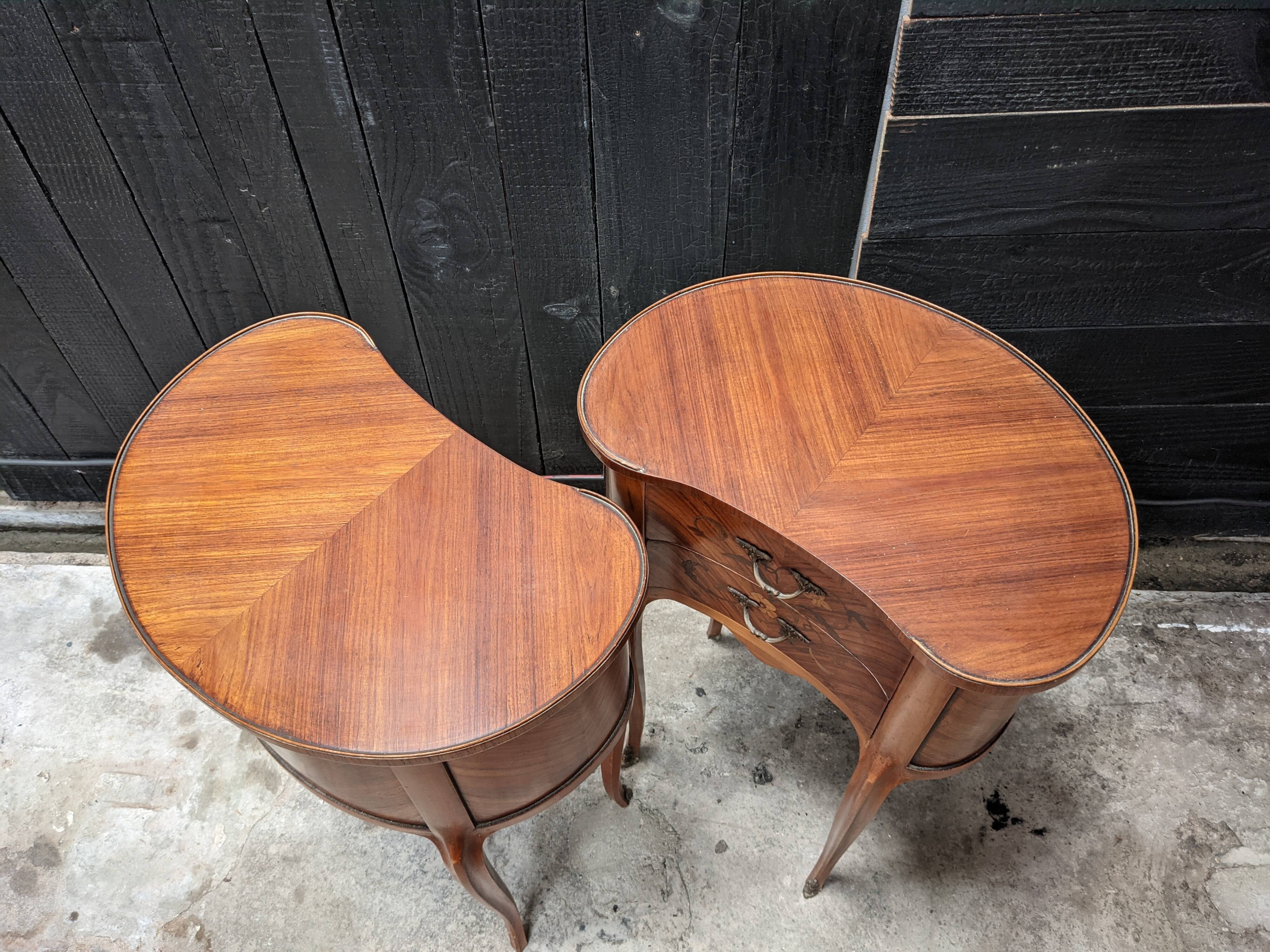 Pair of kidney bedside tables