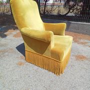 Pair of armchairs with golden velvet fringes