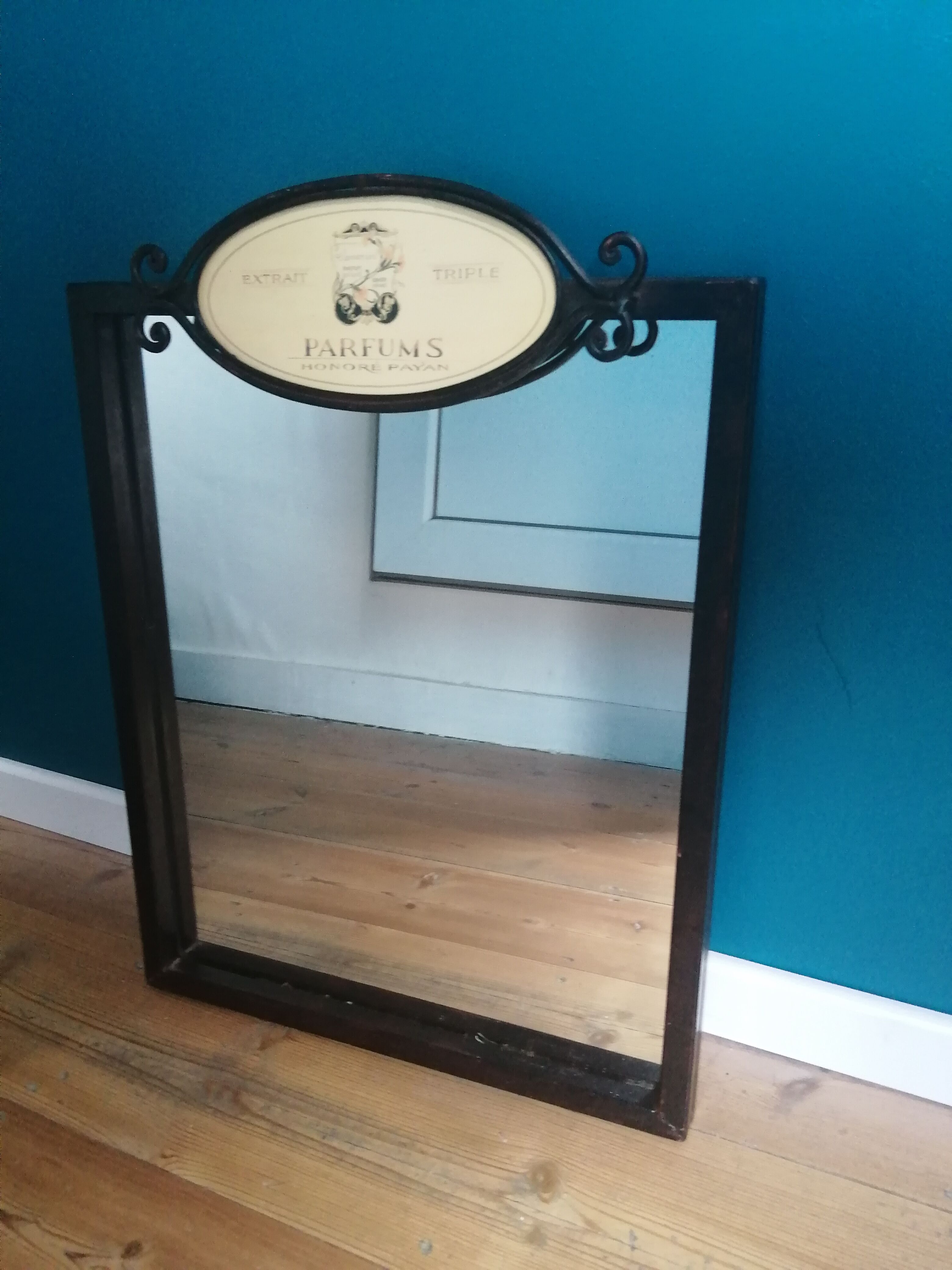 Mirror metal sign perfume