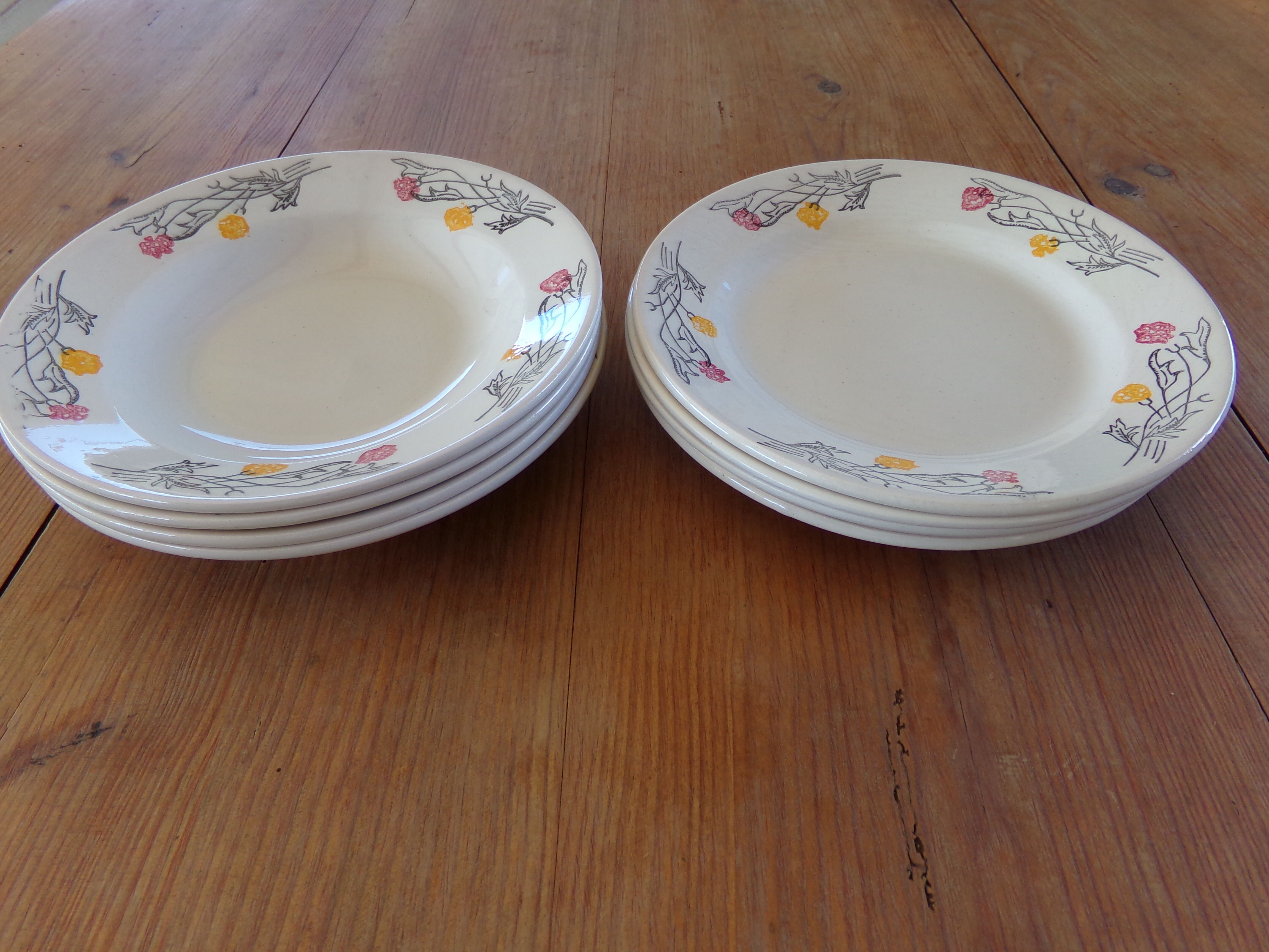 4 hollow plates and 4 old flat plates with floral decoration