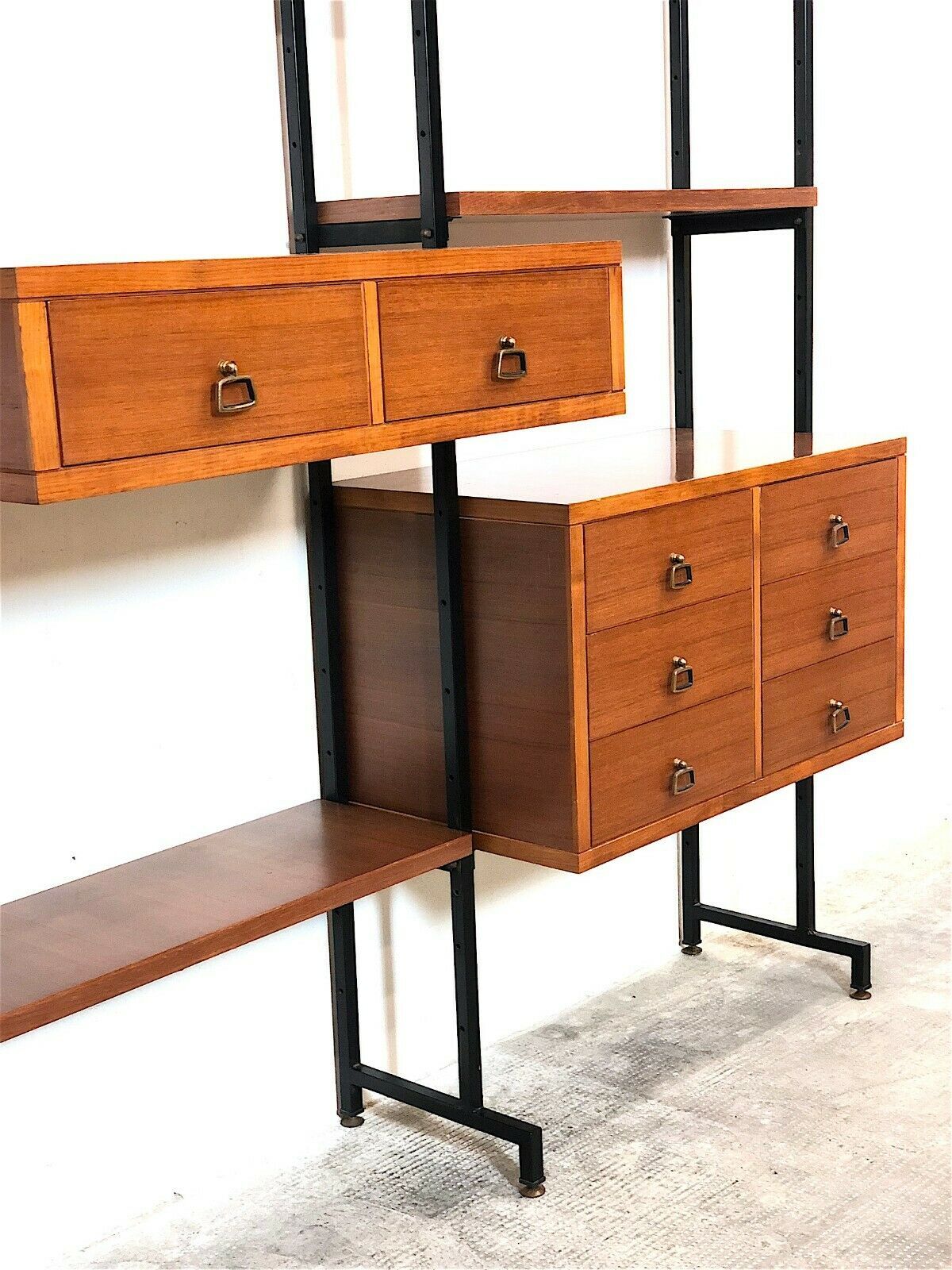 Modular storage unit and teak bookcase. Italy, 60s