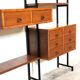 Modular storage unit and teak bookcase. Italy, 60s