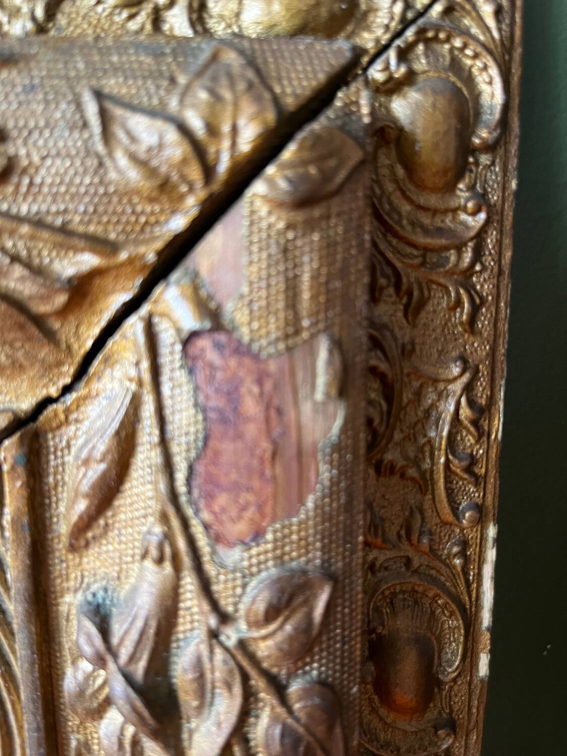 Golden trumeau mirror for fireplace, late 19th century, with sculpted pediment.