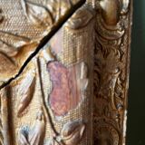 Golden trumeau mirror for fireplace, late 19th century, with sculpted pediment.