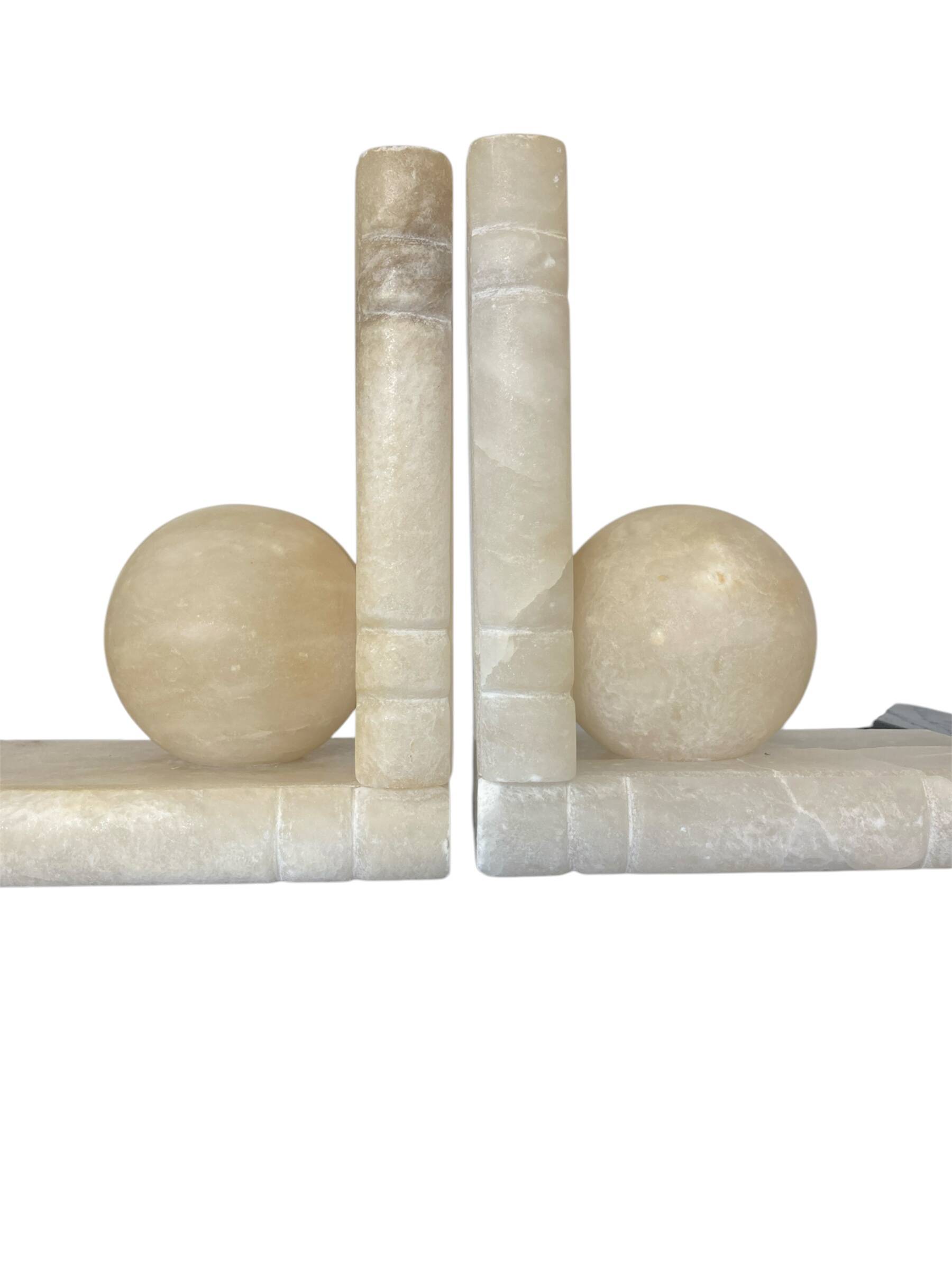 Paire de serres livres, Albâtre, Période Années 1930