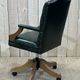 English chesterfield office armchair in green leather from the 1980s