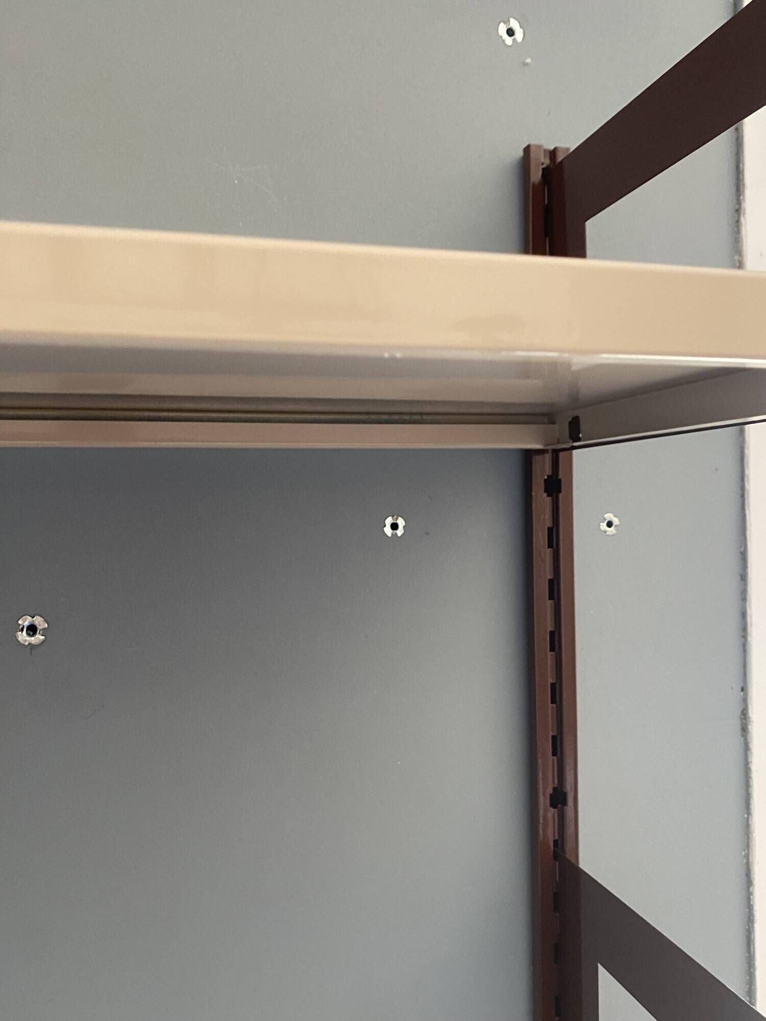 Modular metal wall shelf in brown and beige vintage 70s design.