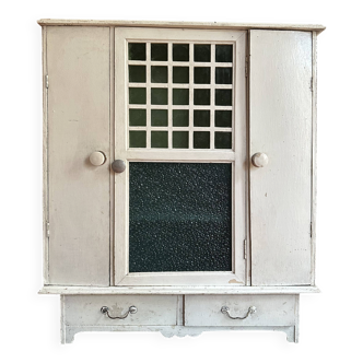 Antique Art Nouveau medicine cabinet in wood and cathedral glass.