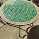 Round zellige table with metal legs and green tile top