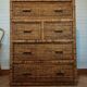 High wood and rattan chest of drawers