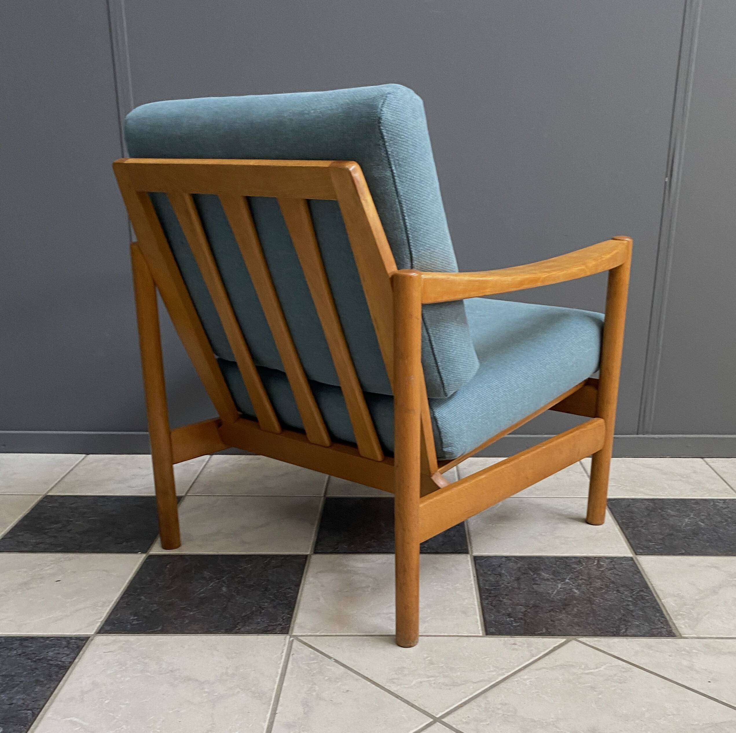 Wood arm chair reupholstered in blue fabric 1960s