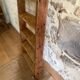 Decorative wooden ladder or towel rack.