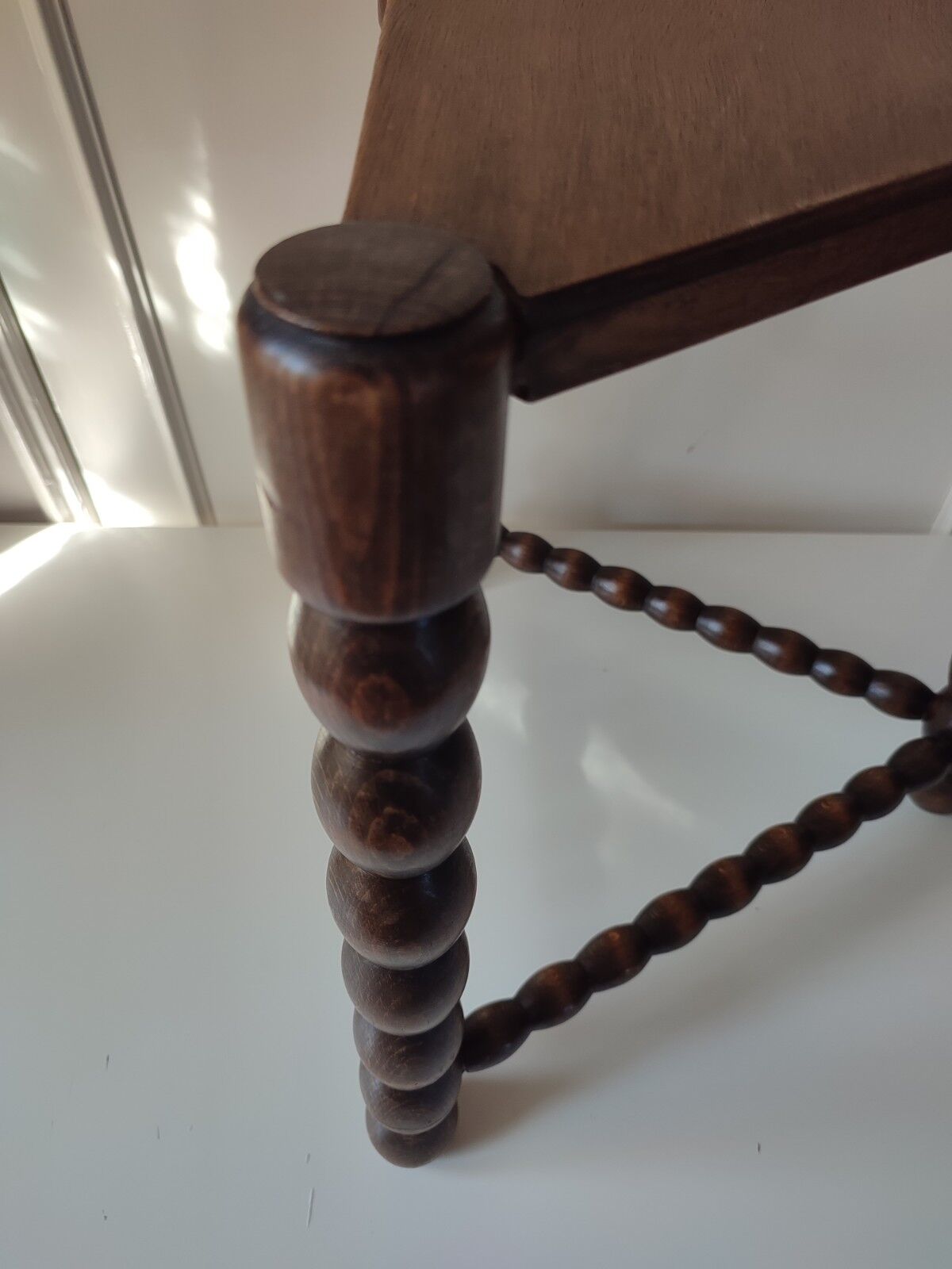 Wood tripod sofa end