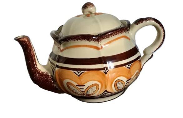 Old porcelain teapot from Pornic around 1950.