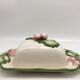 Slurry butter dish, with radish drawings. Signed "FG"