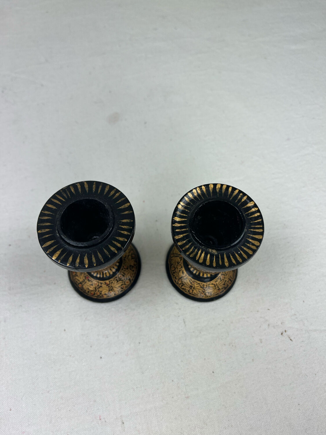 Pair of lacquered wooden candlesticks