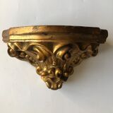 Wall console in gilded plaster