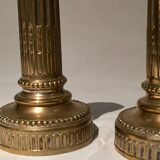 Pair of candlesticks era bronze Louis XVI