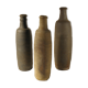 Three old sandstone bottles