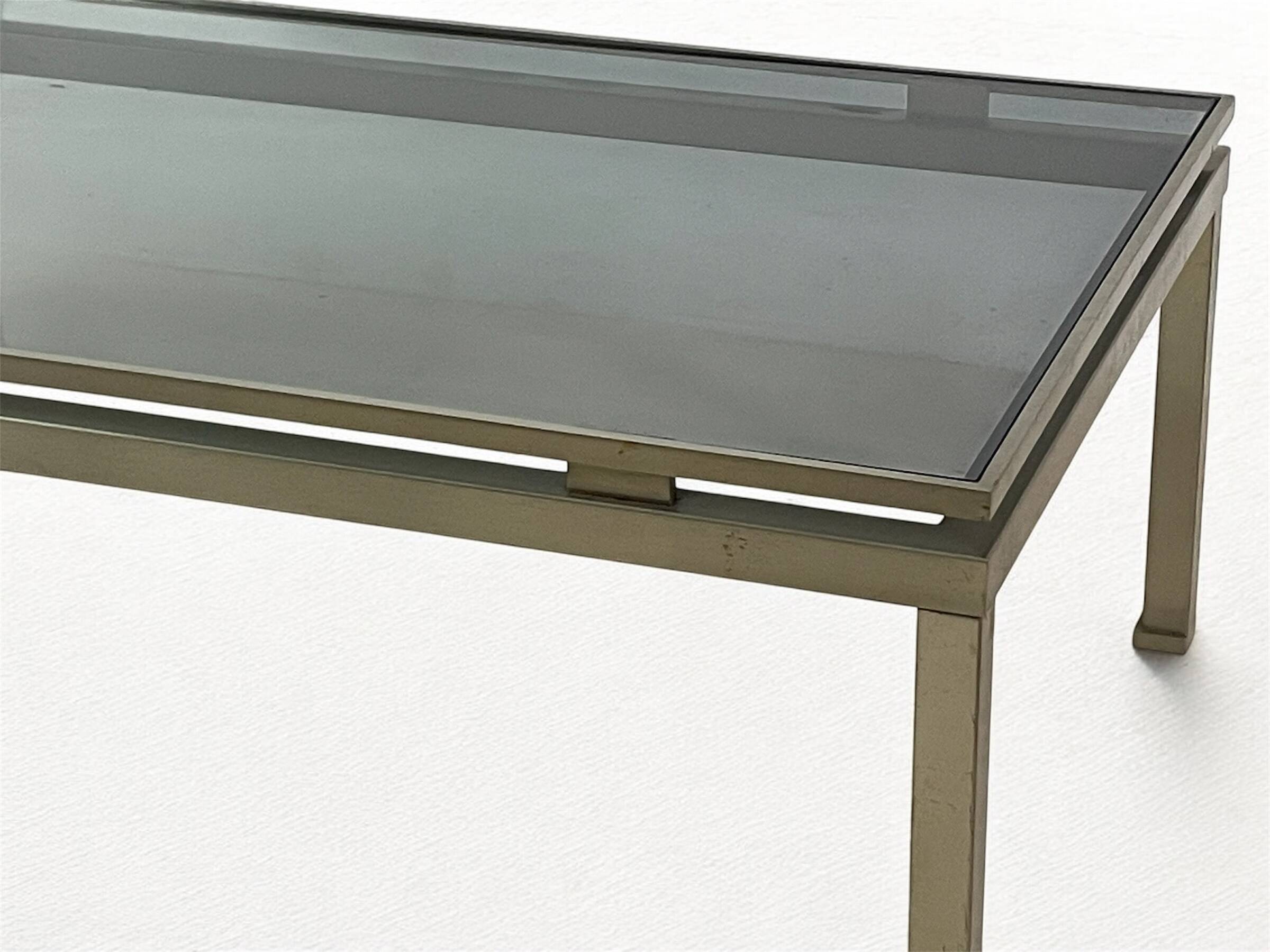 Brass coffee table with smoked glass top by Guy Lefevre, 1970s