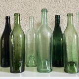 Series of ten old bottles