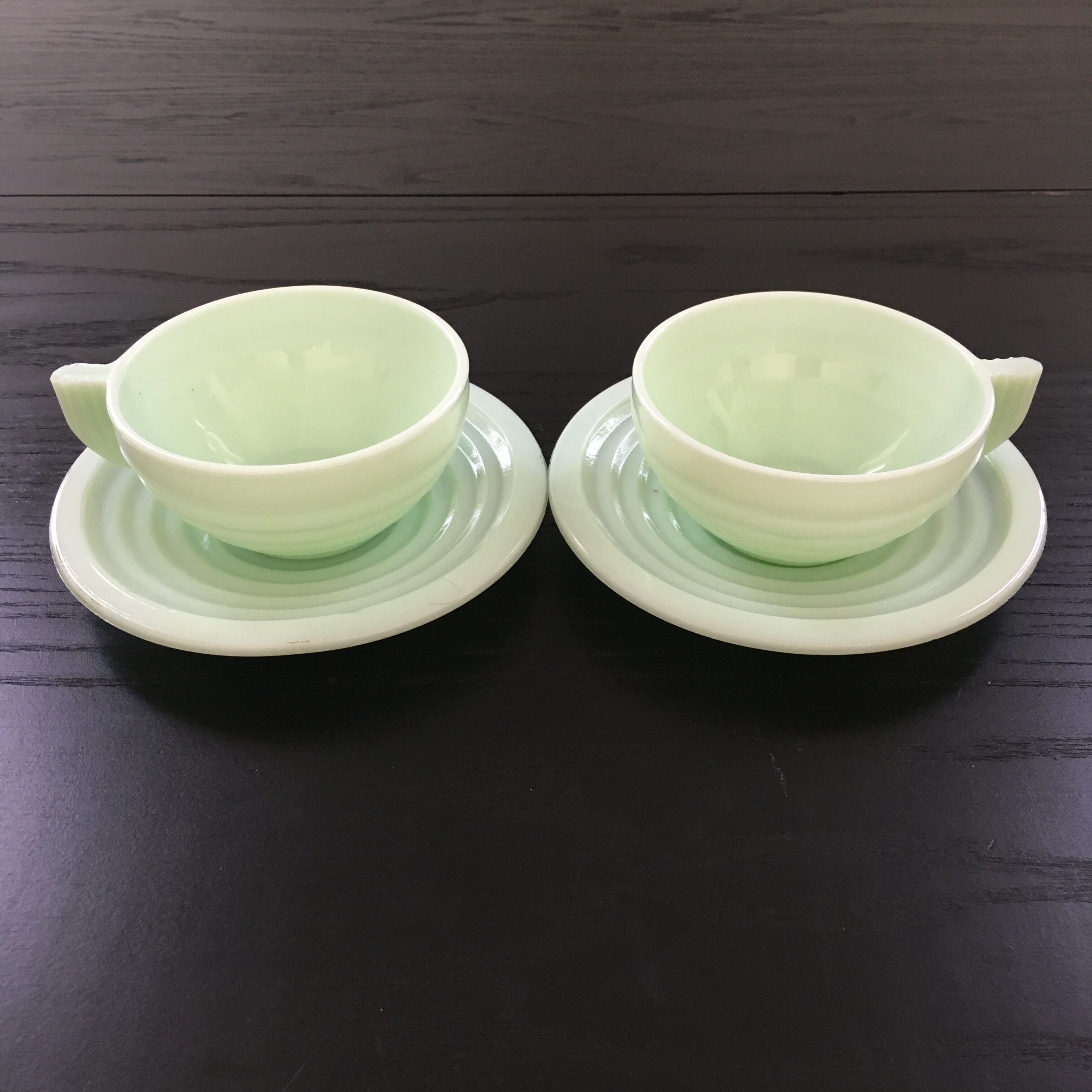 Pair of almond green opaline cups