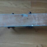 Wall coat holder with two metal pads