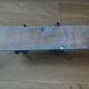 Wall coat holder with two metal pads