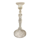 Tall molded glass candle holder with ram heads