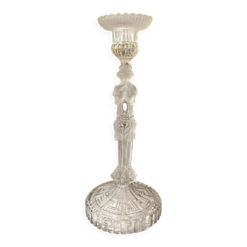 Tall molded glass candle holder with ram heads