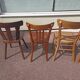 Set of 12 mismatched wooden bistro chairs