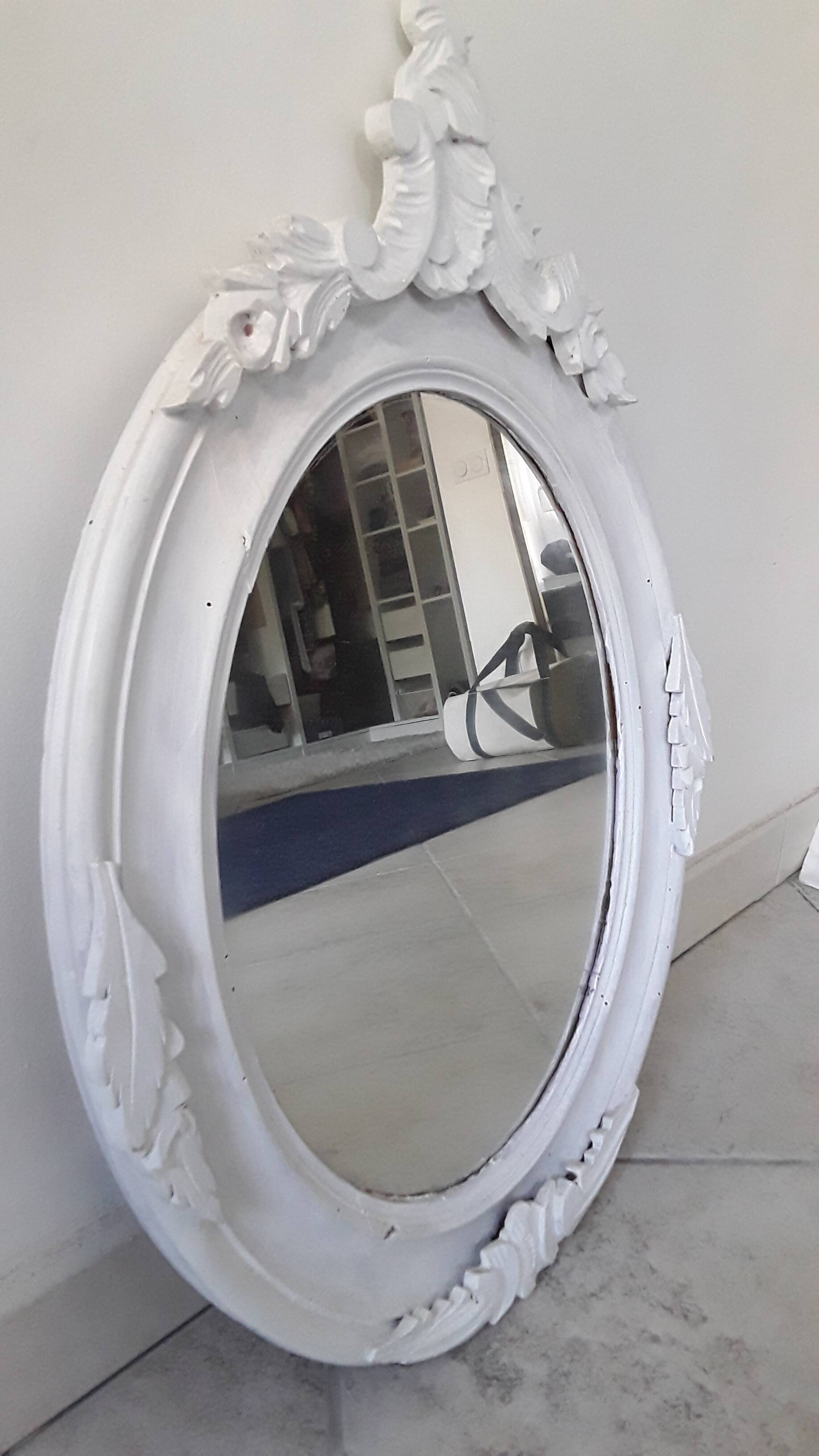 Antique oval mirror in painted wood