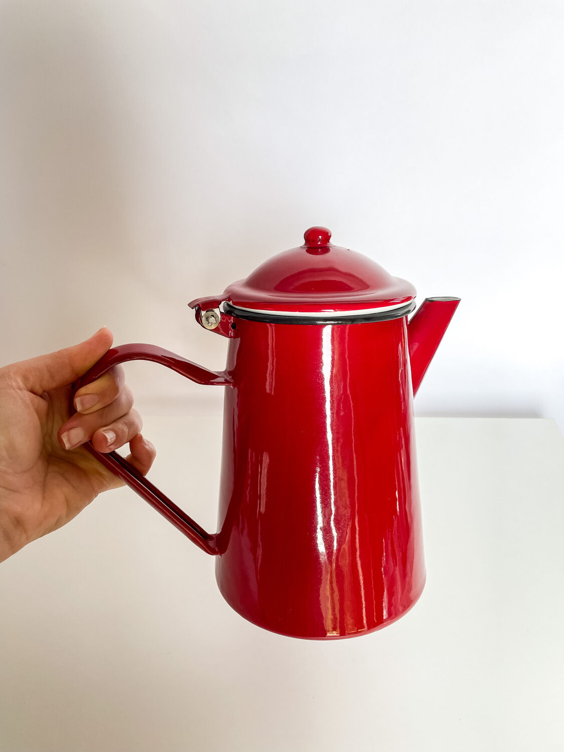 Red enamelled coffee maker