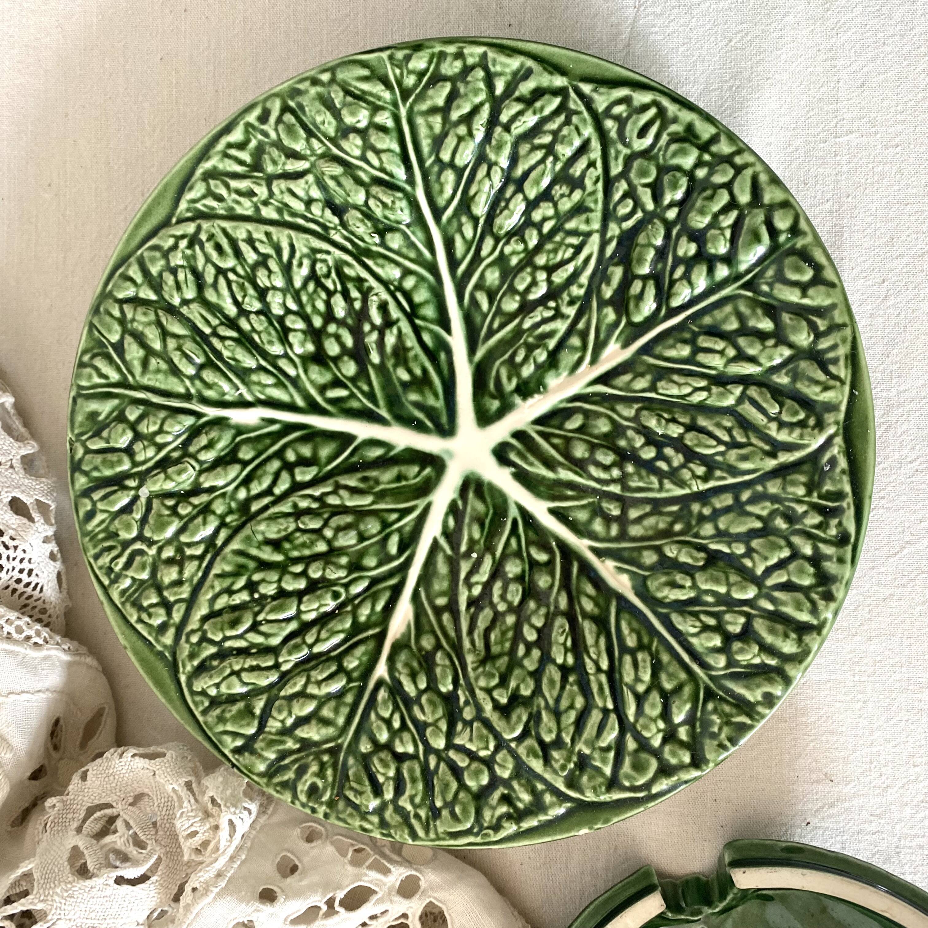 Soup tureen and green cabbage dish in barbotine