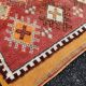 Old orange kilim carpet