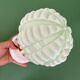 Vintage Art Deco globe wall light in pale green opaline.