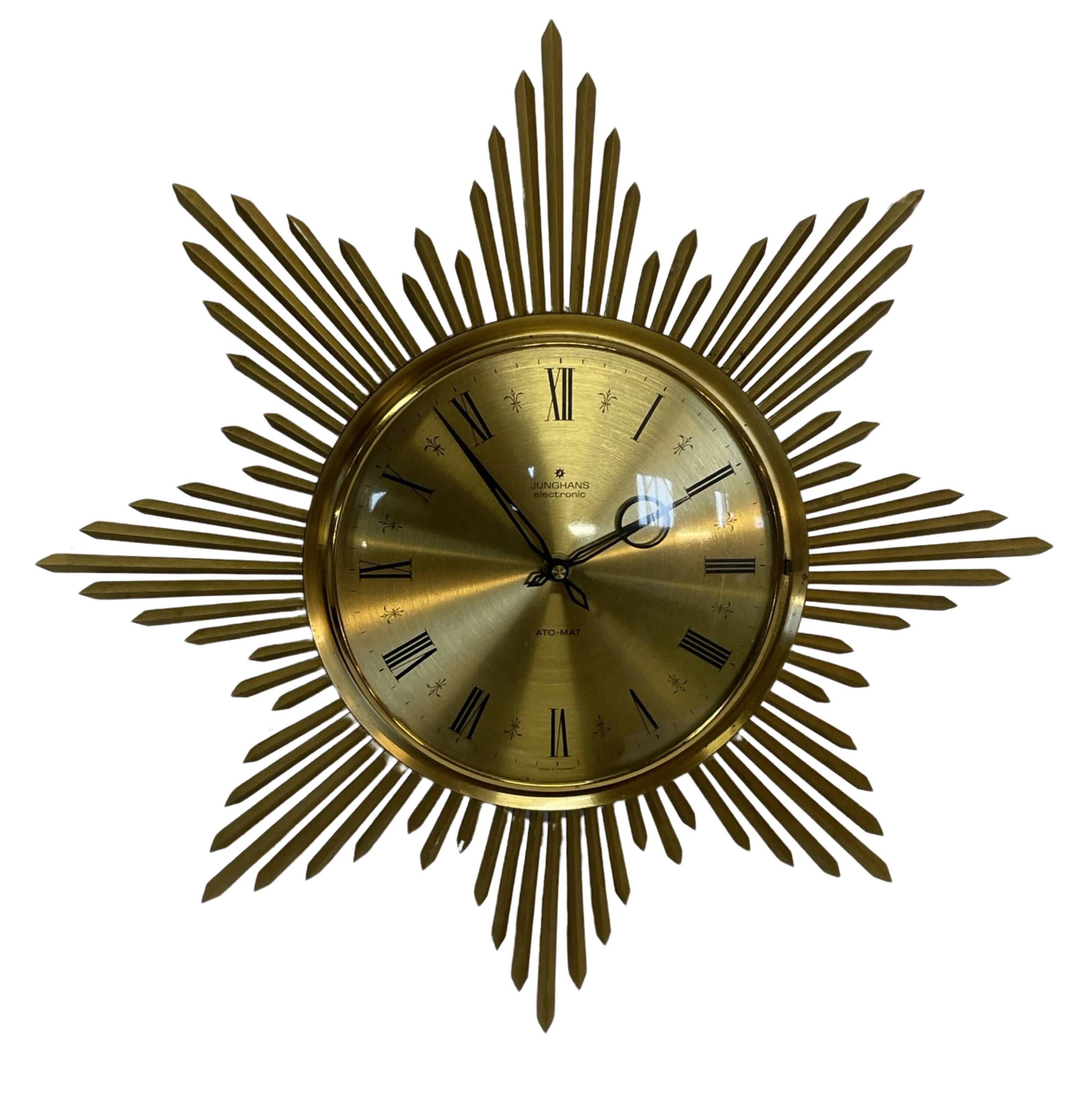 Horloge vintage sunburst de couleur dorée, design Junghans des années 1970
