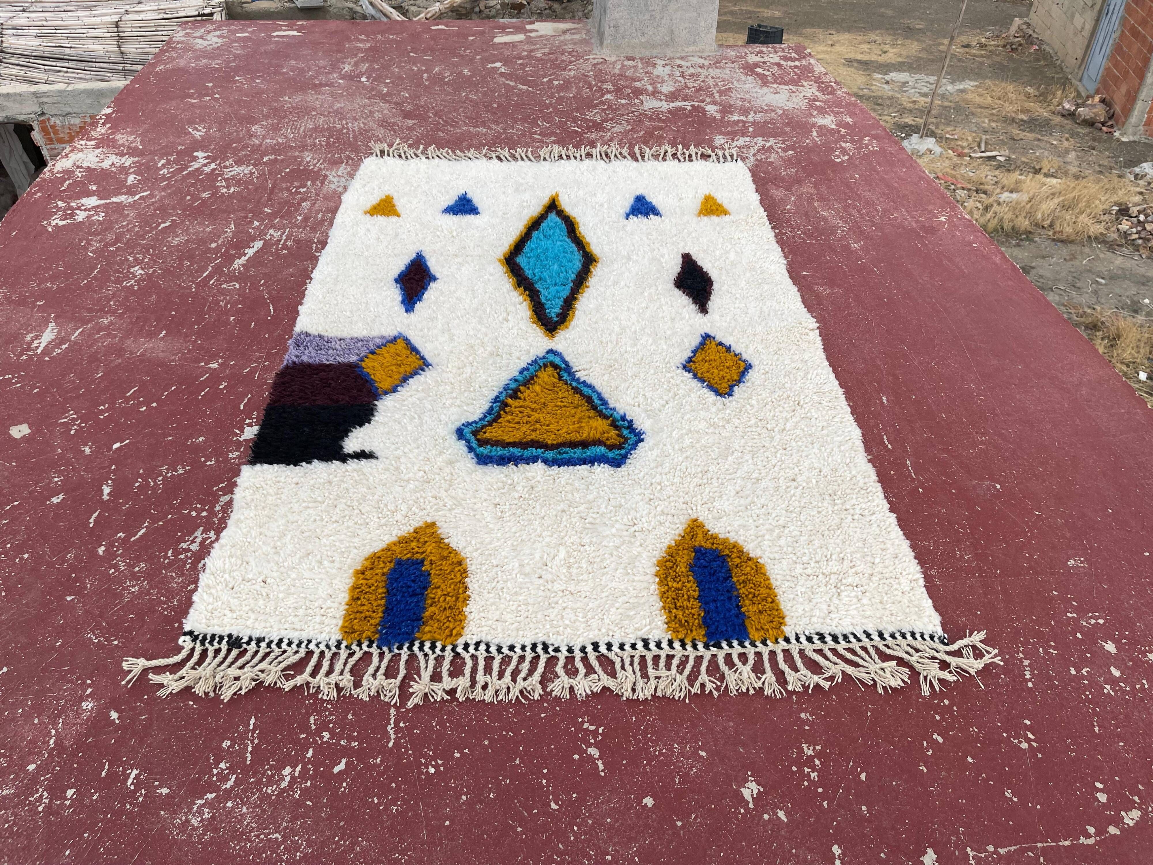 Moroccan Berber rug in cream and blue 250x150 cm – colourful geometric patterns