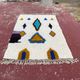 Moroccan Berber rug in cream and blue 250x150 cm – colourful geometric patterns
