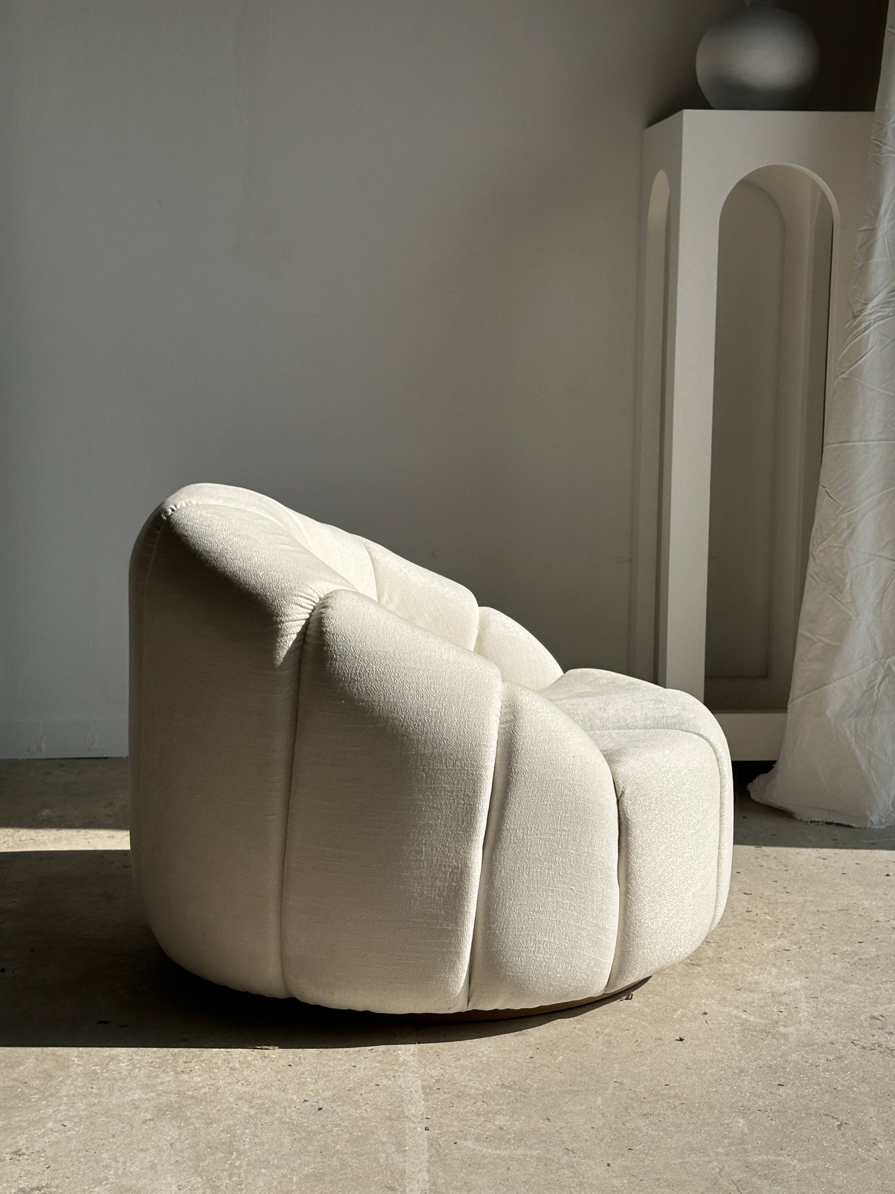 Large white circular armchair, white fabric upholstery