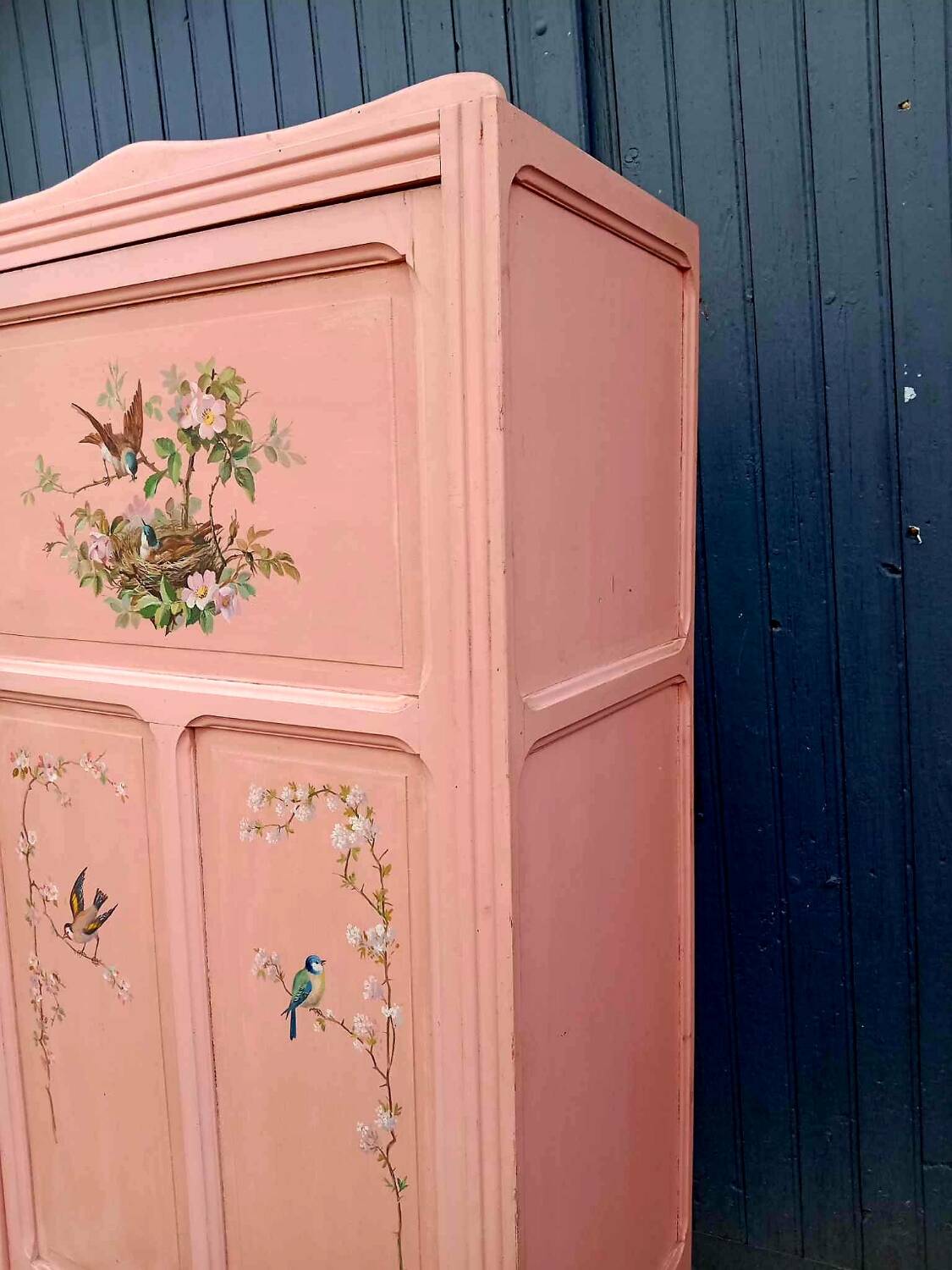 Old pink Parisian cabinet with painted decor