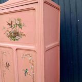 Old pink Parisian cabinet with painted decor