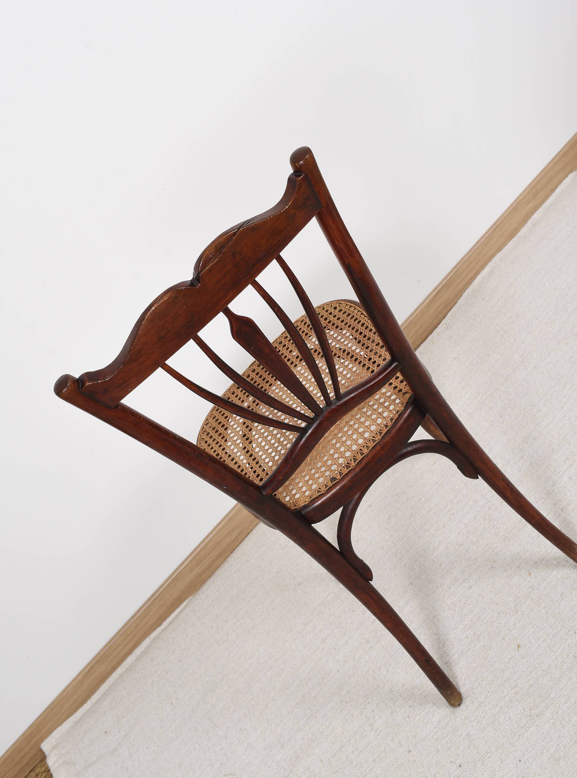 Old cane bistro chair, stamped fischel