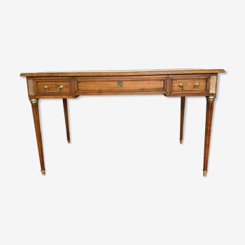 Bureau plat de style Louis XVI Merisier Dessus de cuir rouge XX siècle