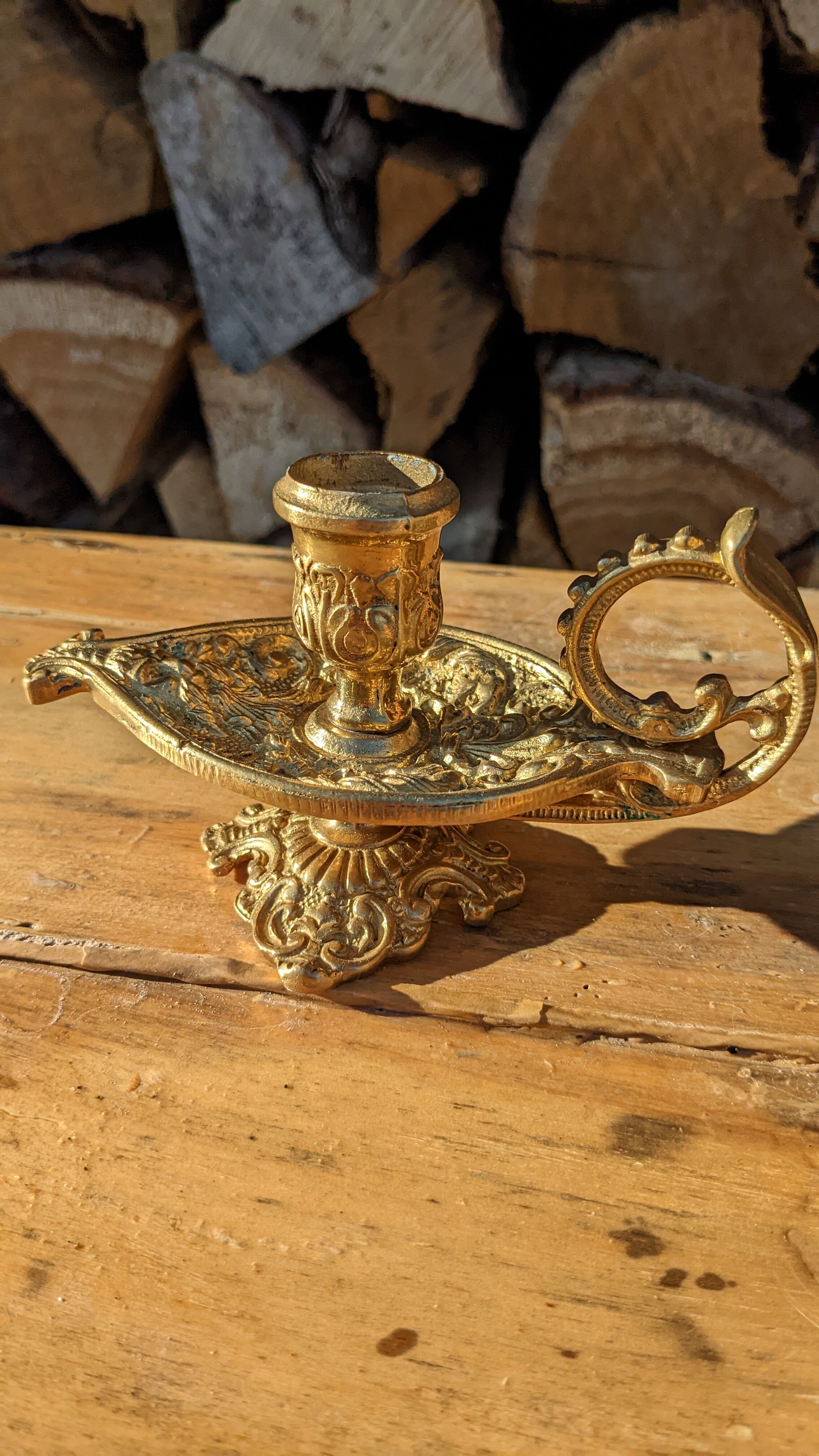 Pair of solid brass and arabesque candle holders