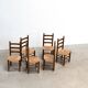 Ensemble de six chaises de salle à manger françaises par Charles Dudouyt