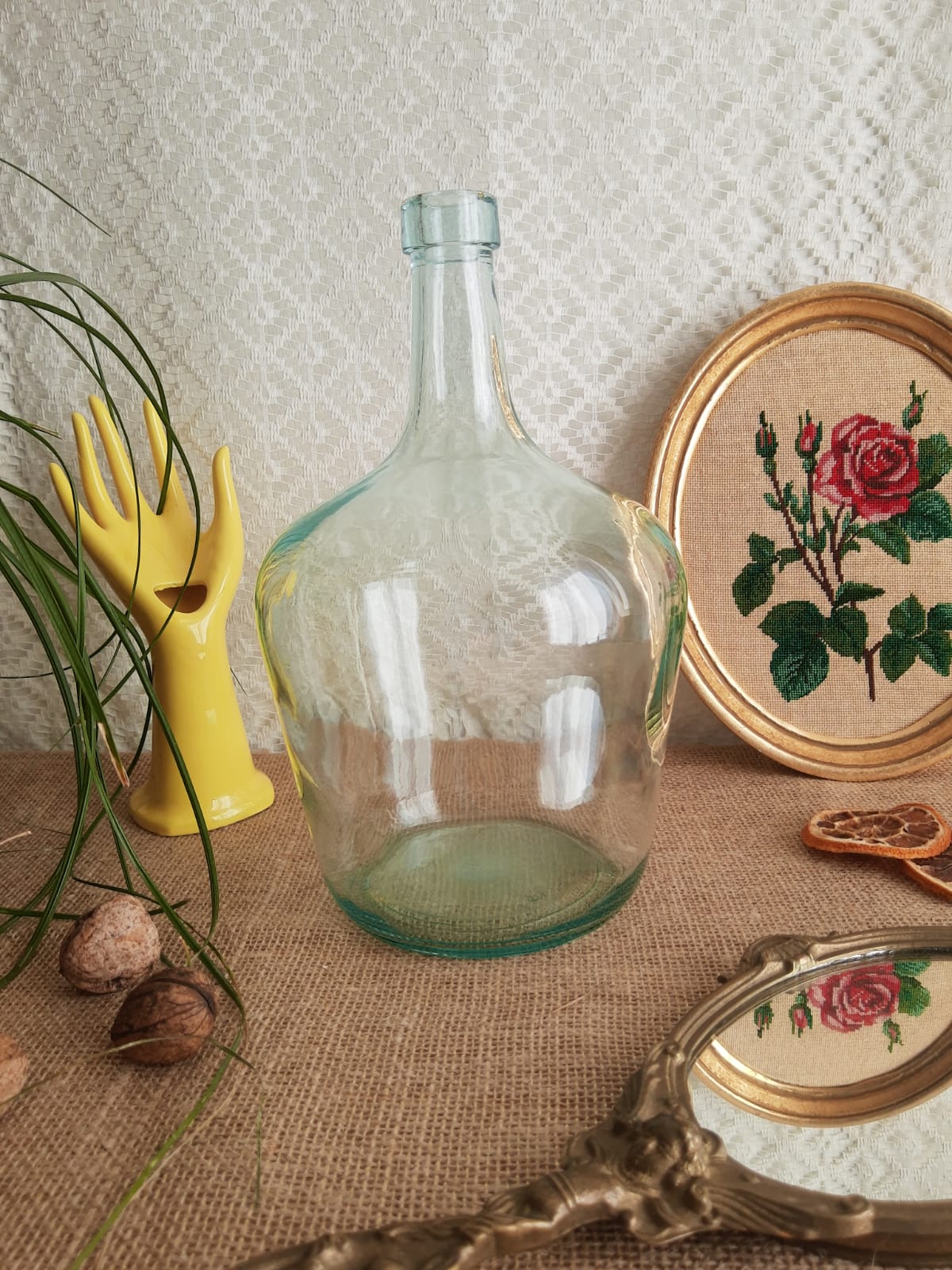 Demijohn in vintage transparent glass