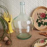 Demijohn in vintage transparent glass