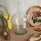 Demijohn in vintage transparent glass