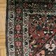 Antique handmade Hamadan Persian rug, ivory medallion on dark background 148x103.